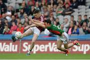 30 July 2016; Brendan Harrison of Mayo with a text book block down  against Dean McNicholas of Westmeath during the GAA Football All-Ireland Senior Championship Round 4B match between Westmeath and Mayo at Croke Park in Dublin. Photo by Oliver McVeigh/Sportsfile