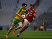 30 July 2016; Enda McCormick of Donegal of Donegal in action against Seán Ryan of Cork during the Electric Ireland GAA Football All-Ireland Minor Championship Quarter-Final match between Donegal and Cork at Croke Park in Dublin. Photo by Ray McManus/Sportsfile