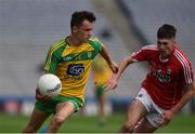 30 July 2016; Eoghan McGettigan of Donegal in action against Aidan Browne of Cork during the Electric Ireland GAA Football All-Ireland Minor Championship Quarter-Final match between Donegal and Cork at Croke Park in Dublin. Photo by Ray McManus/Sportsfile