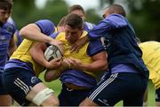 3 August 2016; Ian Keatley of Munster is tackled by Jack O'Donoghue, left, and Simon Zebo during Munster Rugby Squad Training at University of Limerick in Limerick. Photo by Diarmuid Greene/Sportsfile