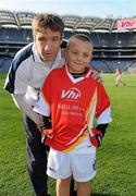 27 September 2010; David McNaughton, from Kildare, with Kildare manager Kieran McGeeney. Vhi GAA Cúl Day Out 2010, Croke Park, Dublin. Picture credit: Oliver McVeigh / SPORTSFILE