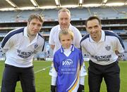 27 September 2010; Fergal Vaughan, from Down, with Kildare manager Kieran McGeeney, Declan Moran, Director of Marketing and Business Development Vhi, and Cavan footballer Paul Brady. Vhi GAA Cúl Day Out 2010, Croke Park, Dublin. Picture credit: Oliver McVeigh / SPORTSFILE
