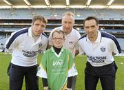 27 September 2010; Darragh McGee, from Fermanagh, with Kildare manager Kieran McGeeney, Declan Moran, Director of Marketing and Business Development Vhi, and Cavan footballer Paul Brady. Vhi GAA Cúl Day Out 2010, Croke Park, Dublin. Picture credit: Oliver McVeigh / SPORTSFILE