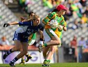 26 September 2010; R—is’n McCafferty, Donegal, in action against Maria Delahunty, Waterford. TG4 All-Ireland Intermediate Ladies Football Championship Final, Donegal v Waterford, Croke Park, Dublin. Picture credit: Dáire Brennan / SPORTSFILE