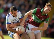 3 October 2010; Martin Harney, Ballinderry Shamrocks, in action against Ciaran Mullan, Coleraine Eoghan Rua. Derry County Senior Football Championship Final, Ballinderry v Coleraine Eoghan Rua, Celtic Park, Derry. Picture credit: Oliver McVeigh / SPORTSFILE