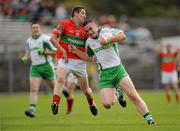 3 October 2010; Mikey English, Baltinglass, in action against Paul Merrigan, Rathnew. Wicklow County Senior Football Championship Final, Rathnew v Baltinglass, County Grounds, Aughrim, Co. Wicklow. Picture credit: Brendan Moran / SPORTSFILE