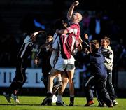 3 October 2010; Noel Morris, Castletown, celebrates with his team-mate Danny Gardiner, 7, and supporters at the end of the game. Wexford County Senior Football Championship Final, Castletown v Kilanerin, Wexford Park, Wexford. Picture credit: David Maher / SPORTSFILE