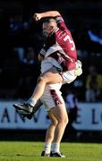 3 October 2010; Noel Morris, Castletown, is held aloft by team-mate Richard Farrell, in celebration, at the end of the game. Wexford County Senior Football Championship Final, Castletown v Kilanerin, Wexford Park, Wexford. Picture credit: David Maher / SPORTSFILE