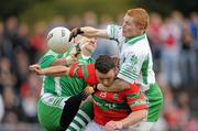 3 October 2010; Leighton Glynn, Rathnew, in action against Baltinglass goalkeeper Ken Quirke and Rory Nolan. Wicklow County Senior Football Championship Final, Rathnew v Baltinglass, County Grounds, Aughrim, Co. Wicklow. Picture credit: Brendan Moran / SPORTSFILE