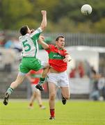3 October 2010; Barry Mernagh, Rathnew, in action against Paul Fleming, Baltinglass. Wicklow County Senior Football Championship Final, Rathnew v Baltinglass, County Grounds, Aughrim, Co. Wicklow. Picture credit: Brendan Moran / SPORTSFILE