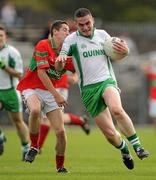 3 October 2010; Mikey English, Baltinglass, in action against Paul Merrigan, Rathnew. Wicklow County Senior Football Championship Final, Rathnew v Baltinglass, County Grounds, Aughrim, Co. Wicklow. Picture credit: Brendan Moran / SPORTSFILE