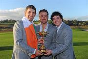 4 October 2010; Padraig Harrington, Graeme McDowell and Rory Mcllroy, Team Europe, with the Ryder Cup. The 2010 Ryder Cup, The Celtic Manor Resort, City of Newport, Wales. Picture credit: Matt Browne / SPORTSFILE