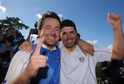 4 October 2010; Graeme McDowell and Padraig Harrington, Team Europe, celebrate on the 18th green. The 2010 Ryder Cup, The Celtic Manor Resort, City of Newport, Wales. Picture credit: Matt Browne / SPORTSFILE