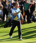 4 October 2010; Graeme McDowell, Team Europe, celebrates his birdie putt on the 16th green during his singles match against Hunter Mahan, Team USA. The 2010 Ryder Cup, The Celtic Manor Resort, City of Newport, Wales. Picture credit: Matt Browne / SPORTSFILE