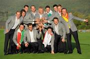 4 October 2010; Team Europe captain Colin Montgomerie holds the Ryder Cup as his players put a hand on it, from left, back row, Luke Donald, Lee Westwood, Martin Kaymer, Peter Hanson, Padraig Harrington, Ross Fisher, Ian Poulter, Miguel Angel Jimenez, front row, from left, Francesco Molinari, Edoardo Molinari, Rory Mcllroy and Graeme McDowell. The 2010 Ryder Cup, The Celtic Manor Resort, City of Newport, Wales. Picture credit: Matt Browne / SPORTSFILE