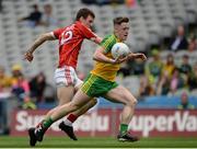 30 July 2016; JD Boyle of Donegal in action against Cathal Maguire of Cork during the Electric Ireland GAA Football All-Ireland Minor Championship Quarter-Final match between Donegal and Cork at Croke Park in Dublin. Photo by Oliver McVeigh/Sportsfile