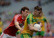 30 July 2016; JD Boyle of Donegal in action against Cathal Maguire of Cork during the Electric Ireland GAA Football All-Ireland Minor Championship Quarter-Final match between Donegal and Cork at Croke Park in Dublin. Photo by Oliver McVeigh/Sportsfile