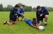 3 August 2016; Leinster's Conor O'Brien, second left, and James Ryan, right, coach participants Tomas Santiago, left, and Daryl Olaniyi during a Leinster Rugby School of Excellence Camp at King's Hospital School in Palmerstown, Dublin. Photo by Seb Daly/Sportsfile