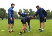 3 August 2016; Leinster's Conor O'Brien, left, and James Ryan, right, coach participants Tomas Santiago, second right, and Daryl Olaniyi during a Leinster Rugby School of Excellence Camp at King's Hospital School in Palmerstown, Dublin. Photo by Seb Daly/Sportsfile