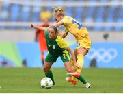 3 August 2016; Stephanie Malherbe of South Africa in action against Sofia Jakobsson of Sweden during the Women's Football first round Group E match between Sweden and South Africa on Day -2 of the Rio 2016 Olympic Games  at the Olympic Stadium in Rio de Janeiro, Brazil. Photo by Stephen McCarthy/Sportsfile
