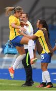 3 August 2016; Monica of Brazil celebrates with team-mate Raquel Fernandes after scoring her side's first goal of the game during the Women's Football first round Group E match between Brazil and China on Day -2 of the Rio 2016 Olympic Games at the Olympic Stadium in Rio de Janeiro, Brazil. Photo by Stephen McCarthy/Sportsfile