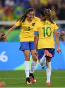 3 August 2016; Aandressa Alves of Brazil celebrates with team-mate Marta, right, after scoring her side's second goal during the Women's Football first round Group E match between Brazil and China on Day -2 of the Rio 2016 Olympic Games at the Olympic Stadium in Rio de Janeiro, Brazil. Photo by Stephen McCarthy/Sportsfile