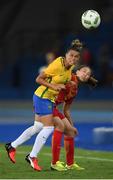 3 August 2016; Tamires of Brazil in action against Li Yang of China during the Women's Football first round Group E match between Brazil and China on Day -2 of the Rio 2016 Olympic Games  at the Olympic Stadium in Rio de Janeiro, Brazil. Photo by Stephen McCarthy/Sportsfile