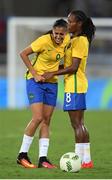3 August 2016; Aandressa Alves of Brazil is held by team-mate Formiga, right, after picking up an injury during the Women's Football first round Group E match between Brazil and China on Day -2 of the Rio 2016 Olympic Games  at the Olympic Stadium in Rio de Janeiro, Brazil. Photo by Stephen McCarthy/Sportsfile