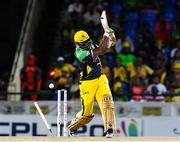 3 August 2016; Andre Russell of Jamaica Tallawahs bowled by Sohail Tanvir of Guyana Amazon Warriors during the Hero Caribbean Premier League match between Guyana Amazon Warriors and Jamaica Tallawahs - Hero Caribbean Premier League (CPL) – Play-off - Match 31 at Warner Park in Basseterre, St Kitts. Photo by Randy Brooks/Sportsfile