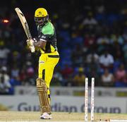 3 August 2016; Chris Gayle of Jamaica Tallawahs bowled by Christopher Barnwell of Guyana Amazon Warriors during the Hero Caribbean Premier League match between Guyana Amazon Warriors and Jamaica Tallawahs - Hero Caribbean Premier League (CPL) – Play-off - Match 31 at Warner Park in Basseterre, St Kitts. Photo by Randy Brooks/Sportsfile