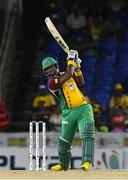 3 August 2016; Dwayne Smith of Guyana Amazon Warriors hits 4 during the Hero Caribbean Premier League match between Guyana Amazon Warriors and Jamaica Tallawahs - Hero Caribbean Premier League (CPL) – Play-off - Match 31 at Warner Park in Basseterre, St Kitts. Photo by Randy Brooks/Sportsfile