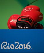 4 August 2016; A detailed view of boxing gloves at the boxing draw in the Teatro Badesco Theatre ahead of the start of the 2016 Rio Summer Olympic Games in Rio de Janeiro, Brazil. Photo by Ramsey Cardy/Sportsfile