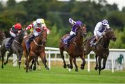 4 August 2016; Laws Of Spin, with Shane Foley up, left, on their way to winning Godolphin Student Initiative Handicap ahead of Romanesque, who finished second, second from right, with Seamie Heffernan up, and Ceol Na Nog, who finished third, with Kevin Manning up, right, during the Bulmers Evening Meeting at Leopardstown in Dublin.  Photo by Cody Glenn/Sportsfile