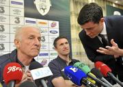 7 October 2010; Republic of Ireland manager Giovanni Trapattoni in conversation with FAI Director of Communications Peter Sherrard, as Robbie Keane looks on, ahead of a press conference ahead of their EURO 2012 Championship Group B Qualifier against Russia on Friday. Republic of Ireland press conference, Hilton Hotel, Clare Hall, Dublin. Picture credit: Brian Lawless / SPORTSFILE