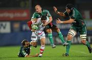 8 October 2010; Paddy Wallace, Ulster, is tackled by Rodd Penney, left, Ludovic Mercier and Aldo Birchall, right, Aironi Rugby. Heineken Cup Pool 4, Round 1, Ulster v Aironi Rugby, Ravenhill Park, Belfast, Co. Antrim. Photo by Sportsfile