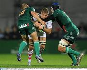 8 October 2010; Chris Henry, Ulster, is tackled by Ludovic Mercier, left, and Marco Bortolami, Aironi Rugby. Heineken Cup Pool 4, Round 1, Ulster v Aironi Rugby, Ravenhill Park, Belfast, Co. Antrim. Photo by Sportsfile