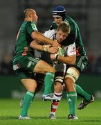 8 October 2010; Chris Henry, Ulster, is tackled by Ludovic Mercier, left, and Marco Bortolami, Aironi Rugby. Heineken Cup Pool 4, Round 1, Ulster v Aironi Rugby, Ravenhill Park, Belfast, Co. Antrim. Photo by Sportsfile