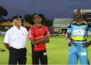4 August 2016;  Darren Sammy (2R) of St. Lucia Zouks toss the coin as Dwayne Bravo (C) of Trinbago Knight Riders and match referee Dev Govindjee (L) look on at the start of the Hero Caribbean Premier League (CPL) – Play-off - Match 32 between St. Lucia Zouks and Trinbago Knight Riders at Warner Park in Basseterre, St Kitts. Photo by Randy Brooks/Sportsfile