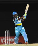 4 August 2016;  Johnson Charles of St. Lucia Zouks hits 6 during the Hero Caribbean Premier League (CPL) – Play-off - Match 32 between St. Lucia Zouks and Trinbago Knight Riders at Warner Park in Basseterre, St Kitts. Photo by Randy Brooks/Sportsfile