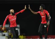 4 August 2016;  Hashim Amla (L) and Ronsford Beaton (R) of Trinbago Knight Riders celebrates the dismissal of Grant Elliott of St. Lucia Zouks during the Hero Caribbean Premier League (CPL) – Play-off - Match 32 between St. Lucia Zouks and Trinbago Knight Riders at Warner Park in Basseterre, St Kitts. Photo by Randy Brooks/Sportsfile