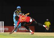 4 August 2016;  Kevon Cooper of Trinbago Knight Riders attempts to stop Shane Shillingford of St. Lucia Zouks from scoring during the Hero Caribbean Premier League (CPL) – Play-off - Match 32 between St. Lucia Zouks and Trinbago Knight Riders at Warner Park in Basseterre, St Kitts. Photo by Randy Brooks/Sportsfile