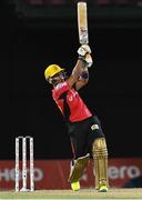 4 August 2016;  Umar Akmal of Trinbago Knight Riders hits 6 during the Hero Caribbean Premier League (CPL) – Play-off - Match 32 between St. Lucia Zouks and Trinbago Knight Riders at Warner Park in Basseterre, St Kitts. Photo by Randy Brooks/Sportsfile
