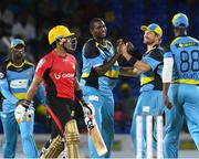 4 August 2016;  Delorn Johnson (2L) and Shane Watson (R) of St. Lucia Zouks celebrate the dismissal of Umar Akmal (L) of Trinbago Knight Riders during the Hero Caribbean Premier League (CPL) – Play-off - Match 32 between St. Lucia Zouks and Trinbago Knight Riders at Warner Park in Basseterre, St Kitts. Photo by Randy Brooks/Sportsfile