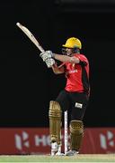 4 August 2016;  Colin Munro of Trinbago Knight Riders hits 6 during the Hero Caribbean Premier League (CPL) – Play-off - Match 32 between St. Lucia Zouks and Trinbago Knight Riders at Warner Park in Basseterre, St Kitts. Photo by Randy Brooks/Sportsfile