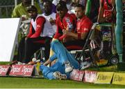 4 August 2016;  David Miller (B) of St. Lucia Zouks attempts to stop the ball as teammates of Trinbago Knight Riders watch during the Hero Caribbean Premier League (CPL) – Play-off - Match 32 between St. Lucia Zouks and Trinbago Knight Riders at Warner Park in Basseterre, St Kitts. Photo by Randy Brooks/Sportsfile