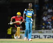 4 August 2016;  Darren Sammy (R) of St. Lucia Zouks reacts as Brendon McCullum (L) of Trinbago Knight Riders makes a run during the Hero Caribbean Premier League (CPL) – Play-off - Match 32 between St. Lucia Zouks and Trinbago Knight Riders at Warner Park in Basseterre, St Kitts. Photo by Randy Brooks/Sportsfile