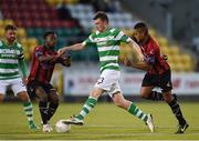 5 August 2016; Sean Heaney of Shamrock Rovers in against Kaleem Simon, left, and Eddie Dsane of Longford, during the SSE Airtricity League Premier Division match between Shamrock Rovers and Longford Town at Tallaght Stadium in Tallaght, Co Dublin. Photo by Sportsfile