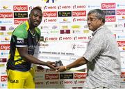 5 August 2016;  Andre Russell (L) of Jamaica Tallawahs receives the player of the match prize from Mr. Komal Samaroo (R) Chairman, El Dorado at the end of the Hero Caribbean Premier League (CPL) – Play-off - Match 33 at Warner Park in Basseterre, St Kitts. Photo by Randy Brooks/Sportsfile