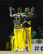 5 August 2016;  Andre Russell (L) and Chris Gayle (R) of Jamaica Tallawahs celebrate winning the Hero Caribbean Premier League (CPL) – Play-off - Match 33 at Warner Park in Basseterre, St Kitts. Photo by Randy Brooks/Sportsfile