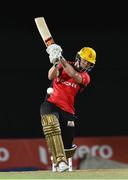 5 August 2016;  Colin Munro of Trinbago Knight Riders hits 4 during the Hero Caribbean Premier League (CPL) – Play-off - Match 33 at Warner Park in Basseterre, St Kitts. Photo by Randy Brooks/Sportsfile